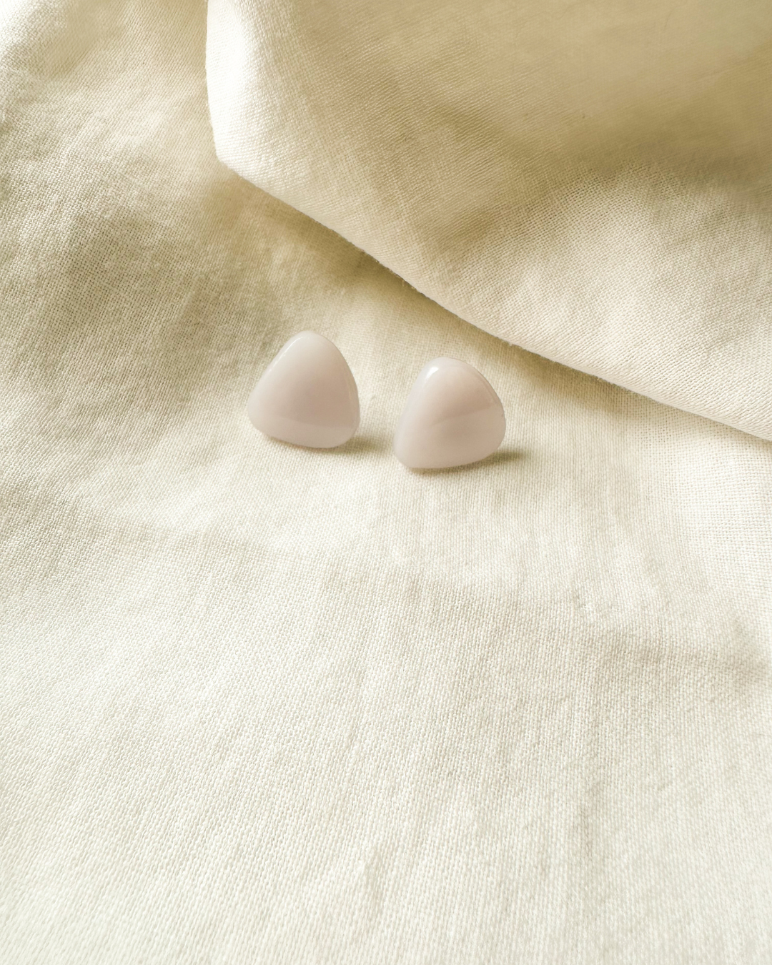 pastel triangle studs